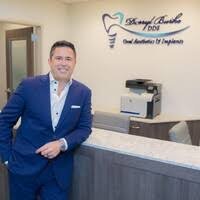 Dr. Darryl Burke, DDS Oral Aesthetics and Implants